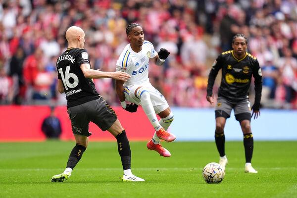 Leeds United's Crysencio Summerville (centre) and Southampton's Will Smallbone (left) battle for the ball. Photo credit: Adam Davy/PA Wire. Leeds United's Crysencio Summerville (centre) and Southampton's Will Smallbone (left) battle for the ball. Photo credit: Adam Davy/PA Wire.