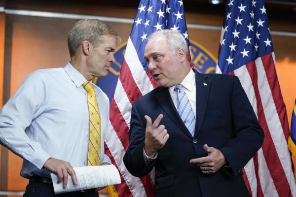 Reps. Jim Jordan and Steve Scalise confer during a news conference at the Capitol in Washington, D.C., June 8, 2022. (J. Scott Applewhite/AP)